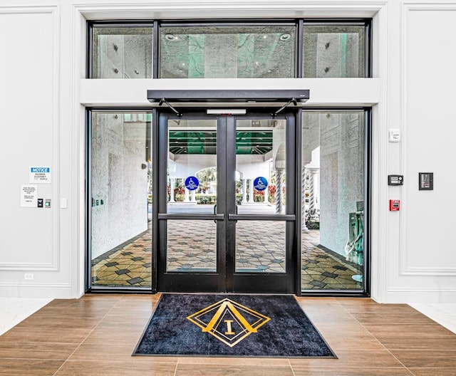 entrance to property featuring french doors