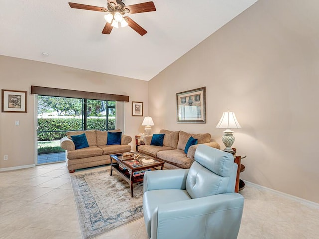 living room with a ceiling fan, vaulted ceiling, baseboards, and light tile patterned floors