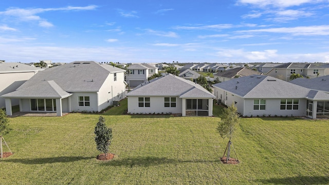 drone / aerial view with a residential view