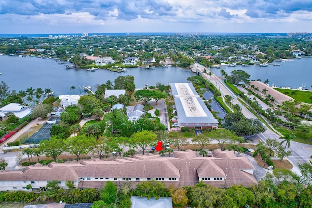 drone / aerial view with a water view