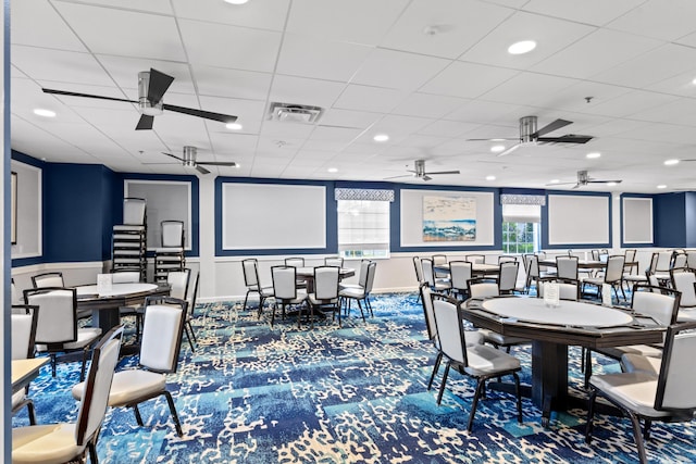 dining room featuring a paneled ceiling, recessed lighting, visible vents, and baseboards