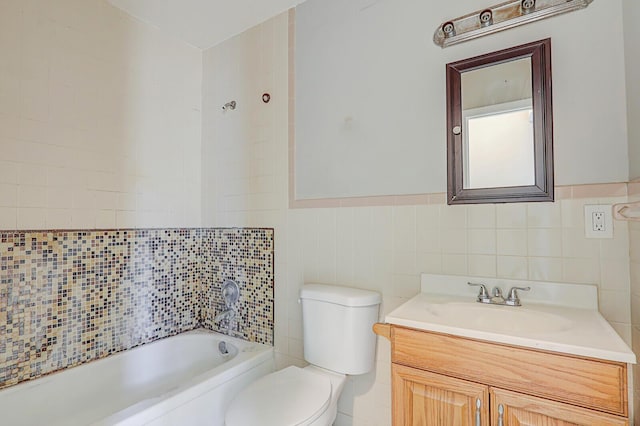 full bathroom with a shower, toilet, a tub, vanity, and tile walls