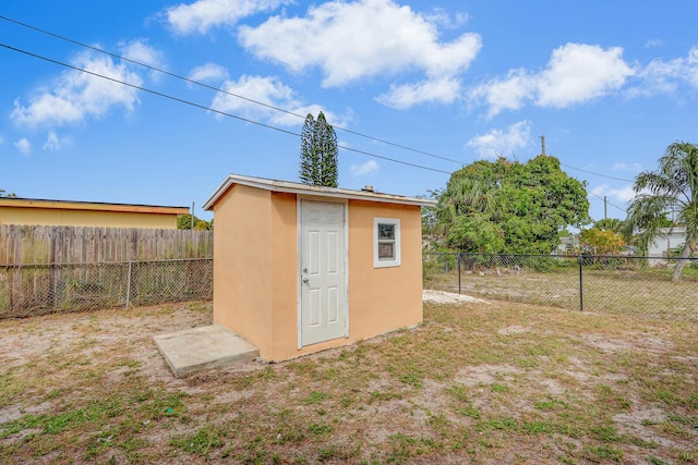 view of shed featuring a fenced backyard