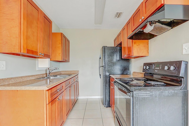 kitchen with light tile patterned floors, black / electric stove, under cabinet range hood, a sink, and visible vents