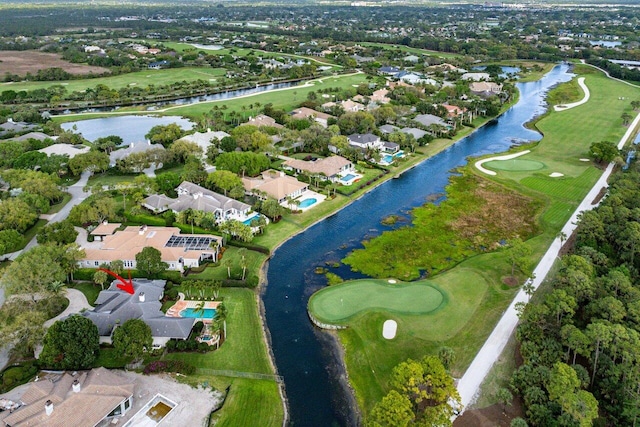 aerial view featuring a water view, a residential view, and golf course view