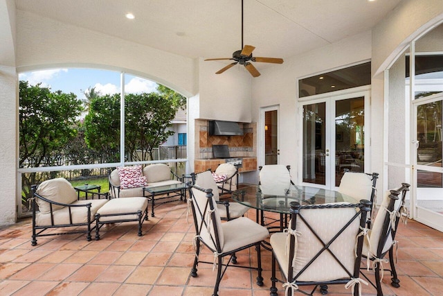 view of patio / terrace featuring a ceiling fan, french doors, and fence