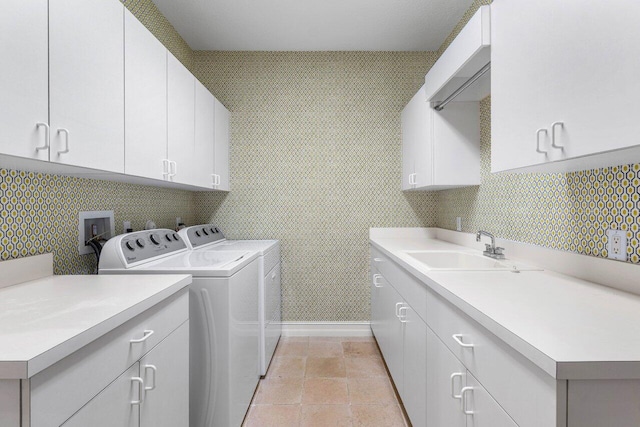 7500 Marsh Cv, Palm Beach Gardens, FL 33418 - laundry area with separate washer and dryer, cabinet space, and light tile patterned flooring