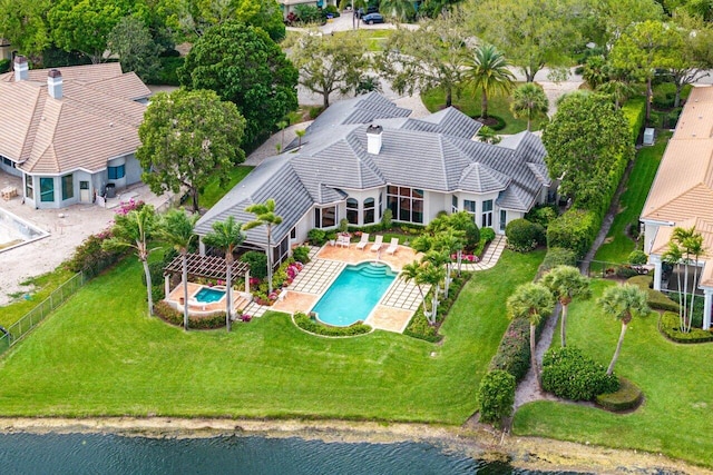 7500 Marsh Cv, Palm Beach Gardens, FL 33418 - aerial view of property and surrounding area with a pool and a large body of water