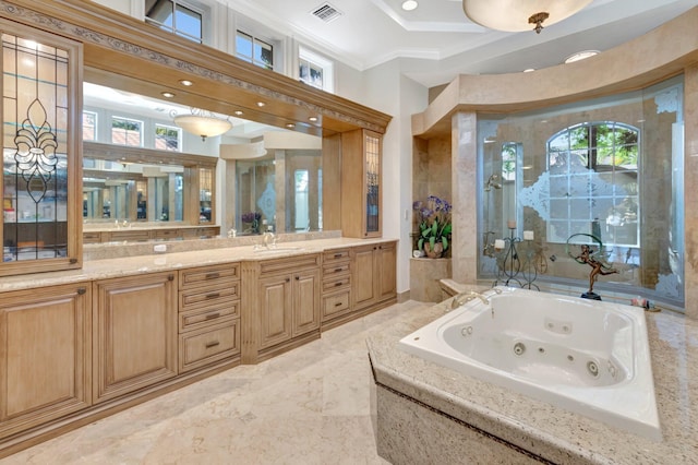 full bathroom with vanity, visible vents, ornamental molding, a jetted tub, and marble finish floor