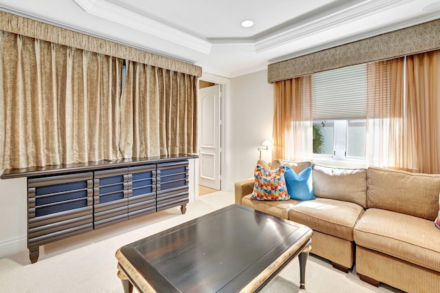 carpeted living area with a tray ceiling, recessed lighting, and ornamental molding