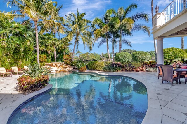 outdoor pool with a patio