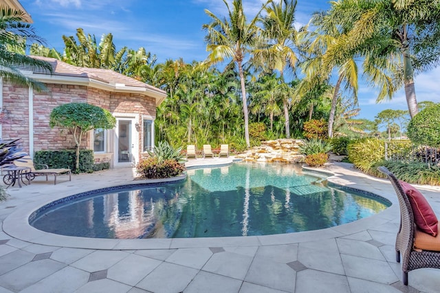 pool with a patio