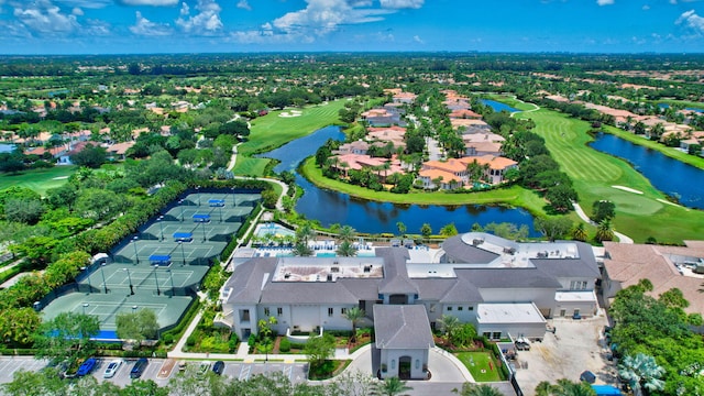 bird's eye view with a residential view, a water view, and view of golf course