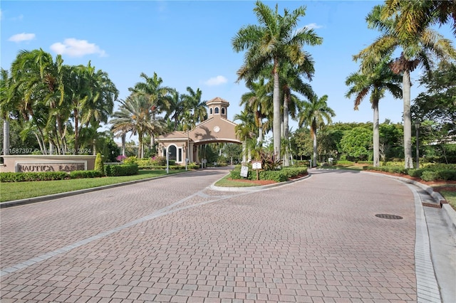 view of street with curbs