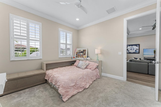 bedroom with baseboards, ornamental molding, carpet flooring, and recessed lighting