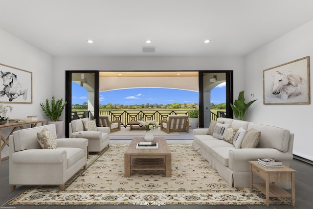 living area with a wealth of natural light and recessed lighting