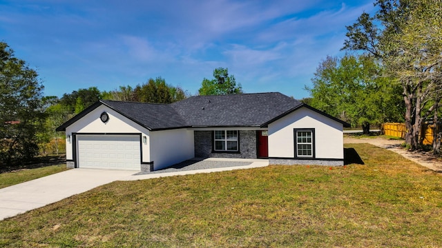 ranch-style home featuring an attached garage, fence, concrete driveway, stucco siding, and a front yard