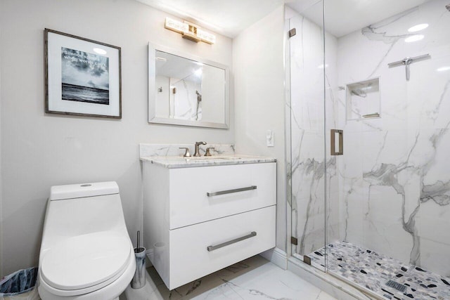 bathroom featuring toilet, marble finish floor, a marble finish shower, and vanity