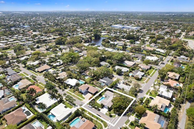 aerial view with a water view and a residential view