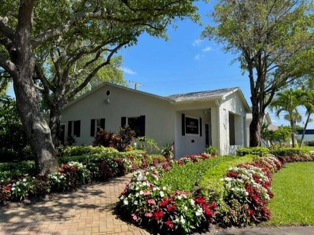 view of front of home with stucco siding