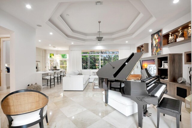 sitting room featuring visible vents, recessed lighting, crown molding, and a tray ceiling