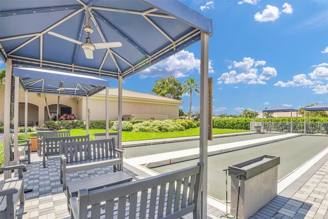 view of patio featuring a ceiling fan