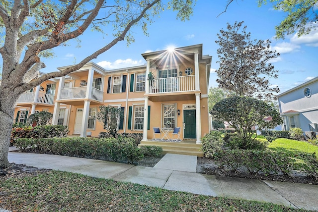 view of front of house featuring stucco siding