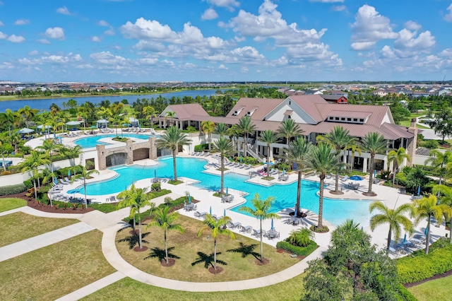 community pool with a patio area