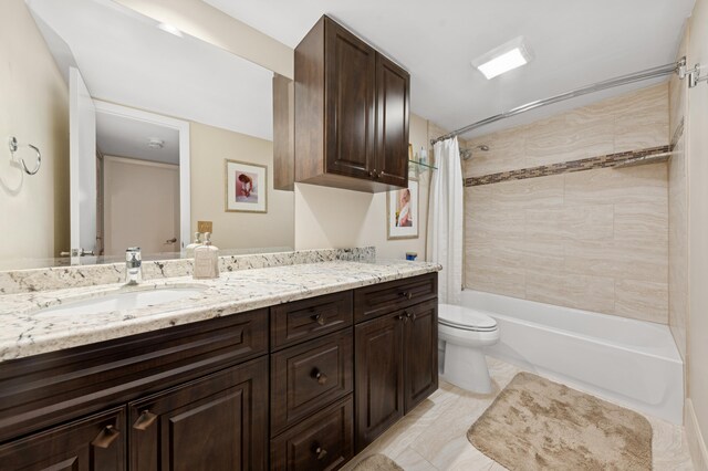 full bath with shower / bathtub combination with curtain, toilet, and vanity