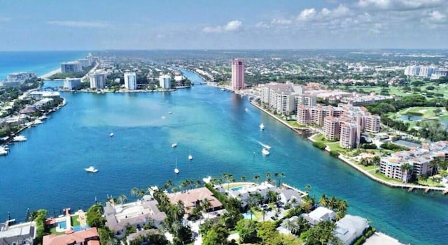 aerial view featuring a water view and a city view