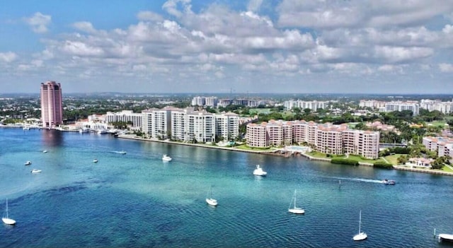 bird's eye view with a water view and a view of city