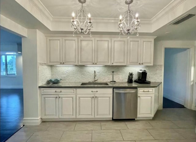 kitchen with a sink, an inviting chandelier, visible vents, and dishwasher