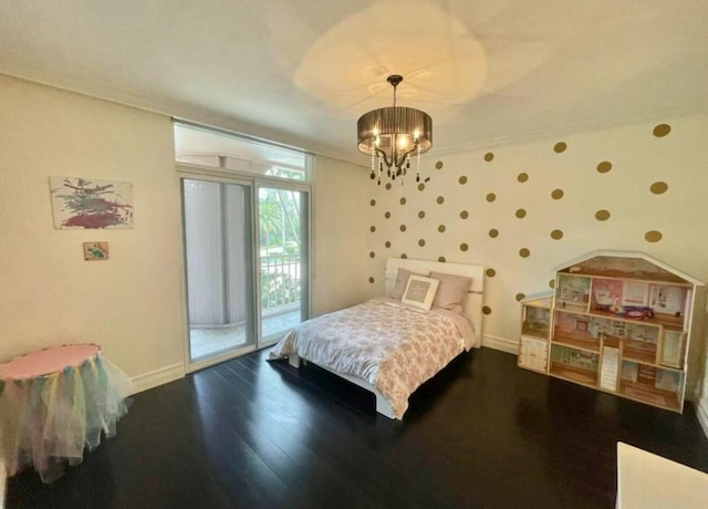 bedroom with access to exterior, baseboards, a chandelier, and dark wood-style flooring