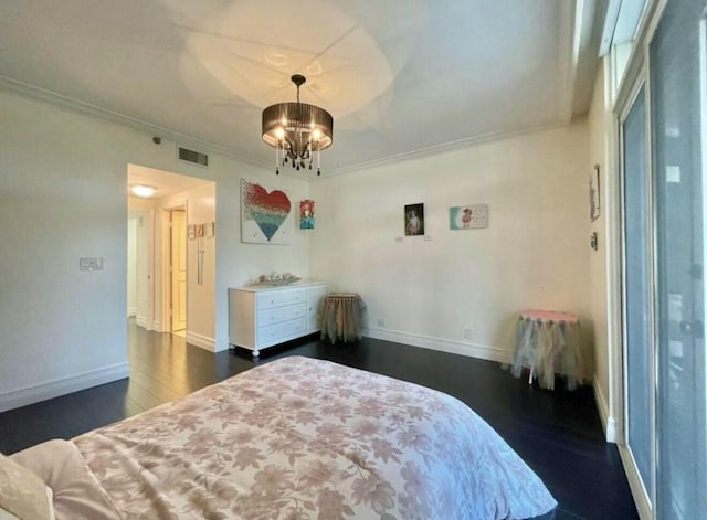 bedroom with visible vents, baseboards, ornamental molding, dark wood-style floors, and an inviting chandelier