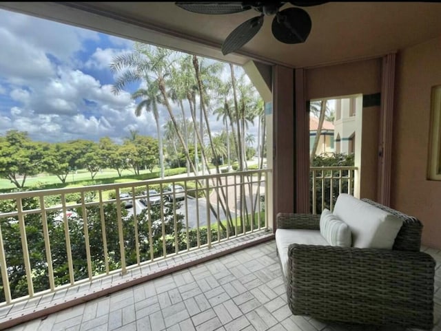 balcony with a ceiling fan