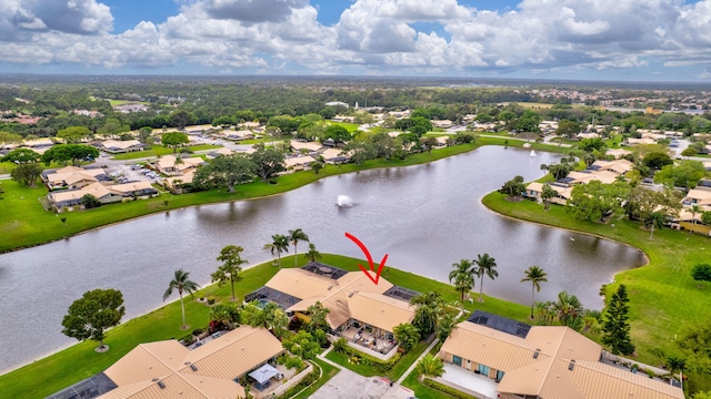 bird's eye view with a water view and a residential view