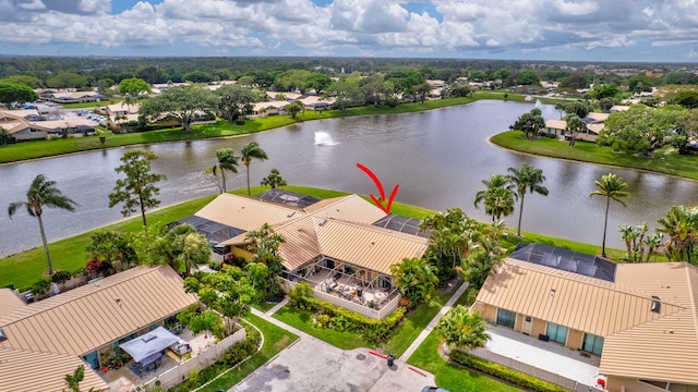 bird's eye view featuring a residential view and a water view