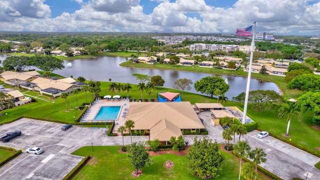 bird's eye view with a water view and a residential view