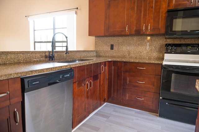 kitchen featuring black microwave, electric range, a sink, stainless steel dishwasher, and tasteful backsplash