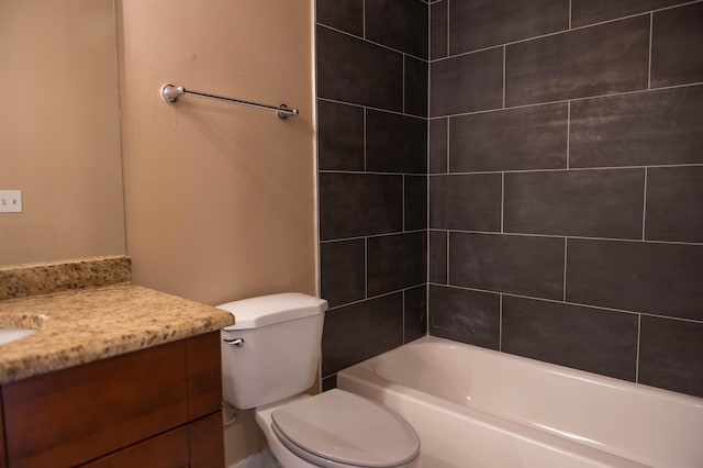 full bathroom with toilet and vanity