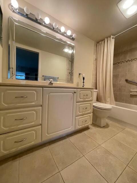 bathroom featuring tile patterned flooring, vanity, toilet, and shower / bath combo