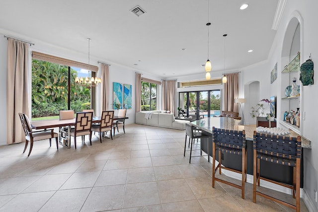 dining room featuring light tile patterned floors, visible vents, ornamental molding, a chandelier, and recessed lighting