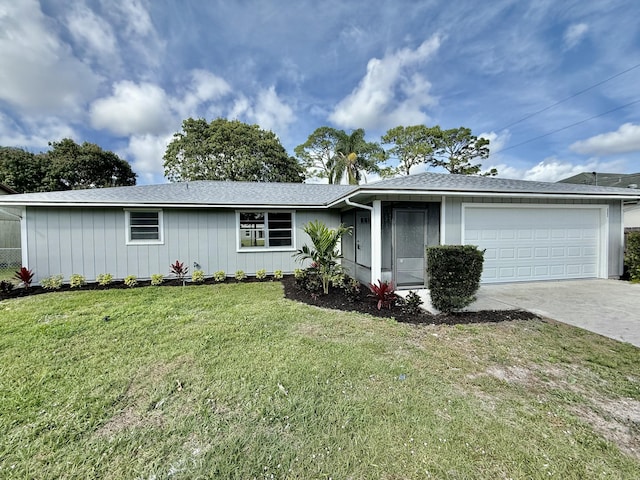 ranch-style house with driveway, roof with shingles, an attached garage, and a front yard