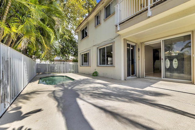 view of pool with a fenced in pool, a patio area, and a fenced backyard