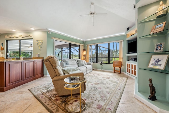 living room with light tile patterned floors, lofted ceiling, a ceiling fan, and built in features