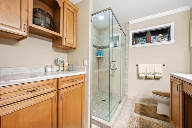 full bath with ornamental molding, a shower stall, toilet, and vanity