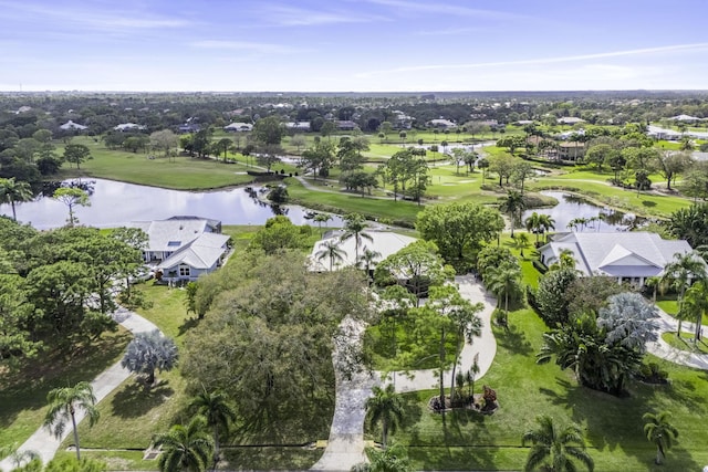 birds eye view of property with a water view, a residential view, and golf course view