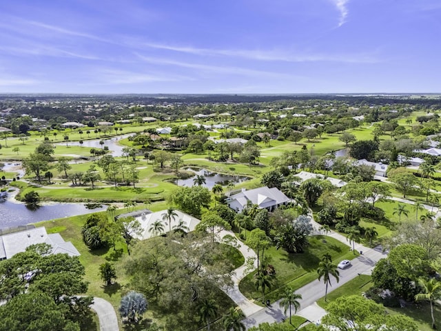 aerial view with view of golf course and a water view