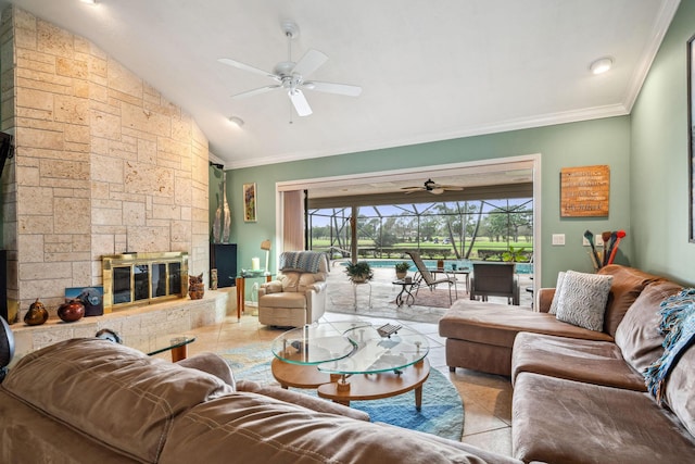 living room with lofted ceiling, a stone fireplace, a sunroom, and crown molding