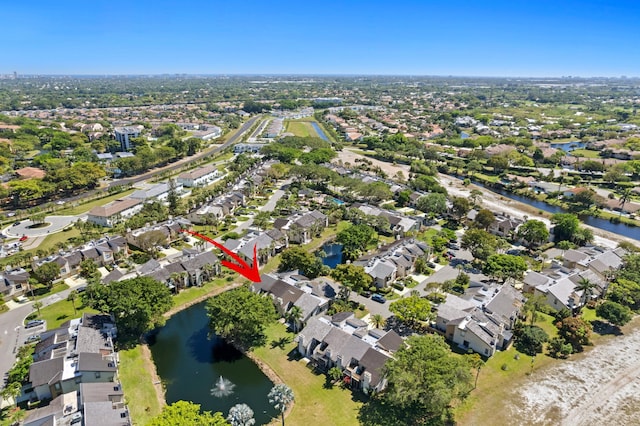 aerial view with a residential view and a water view